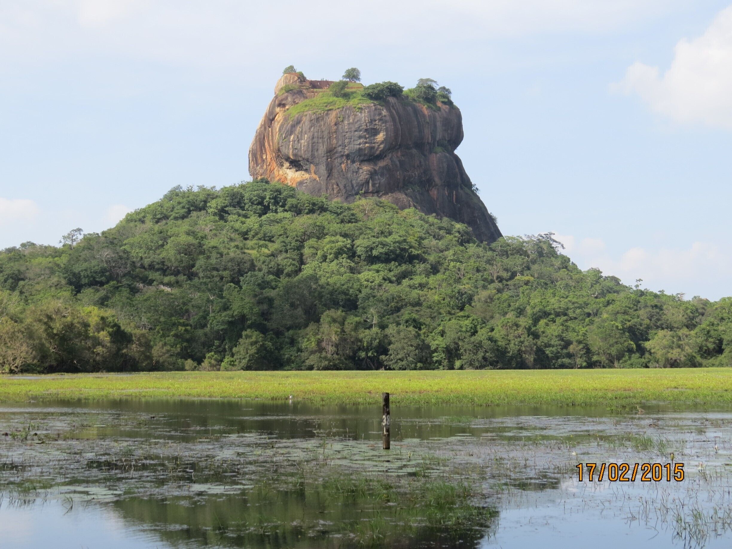 Looks a little like Ayers rock, an ancient village was at the top, just amazing how people would have been able to do that may centuries ago!