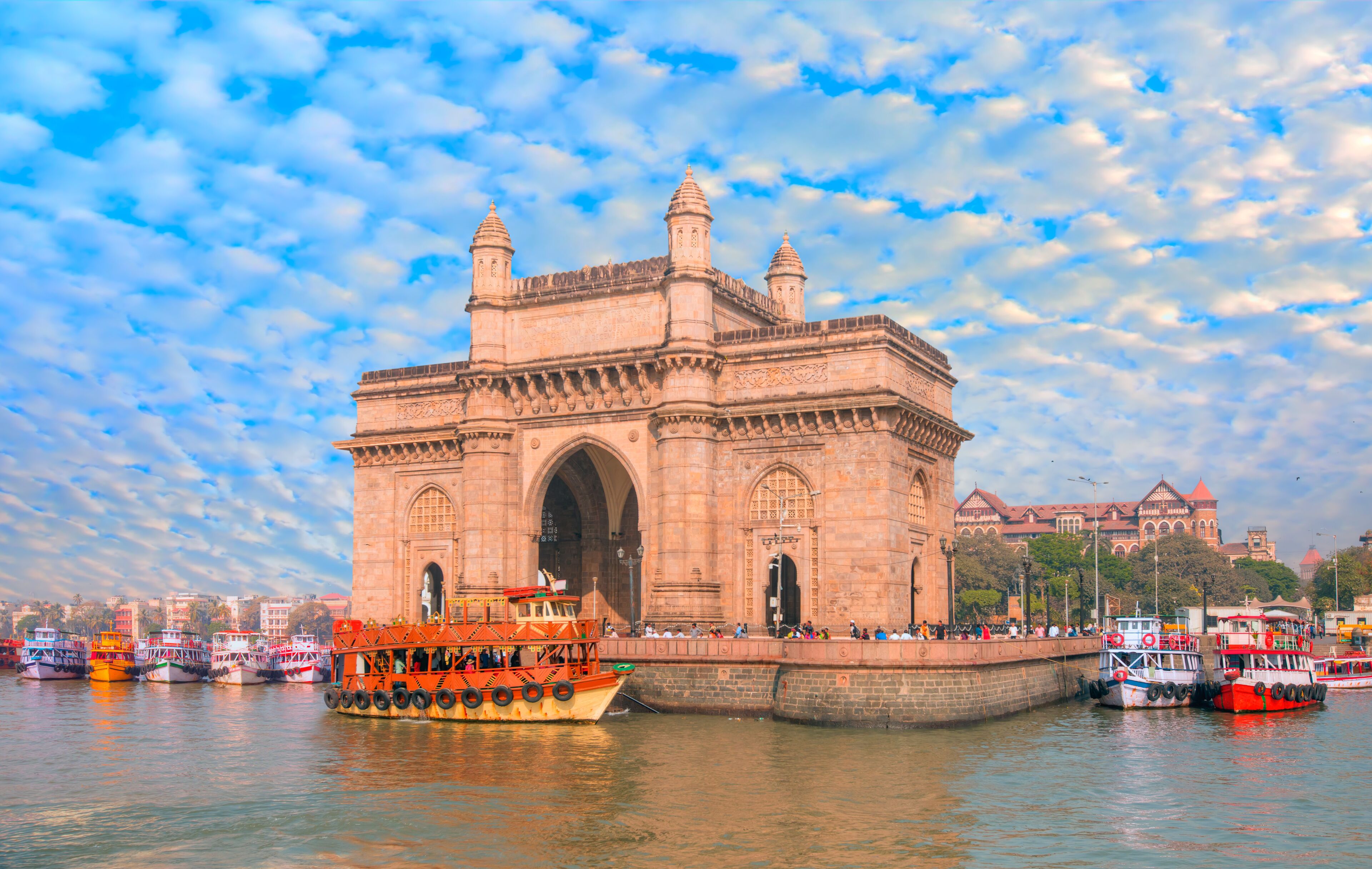 The Gateway of India and boats as seen from the Harbour - Mumbai, India