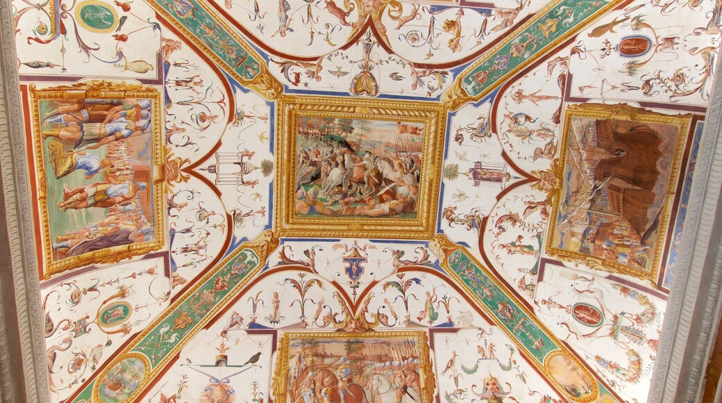 Castiglione del Lago which includes art, interior views and château or palace