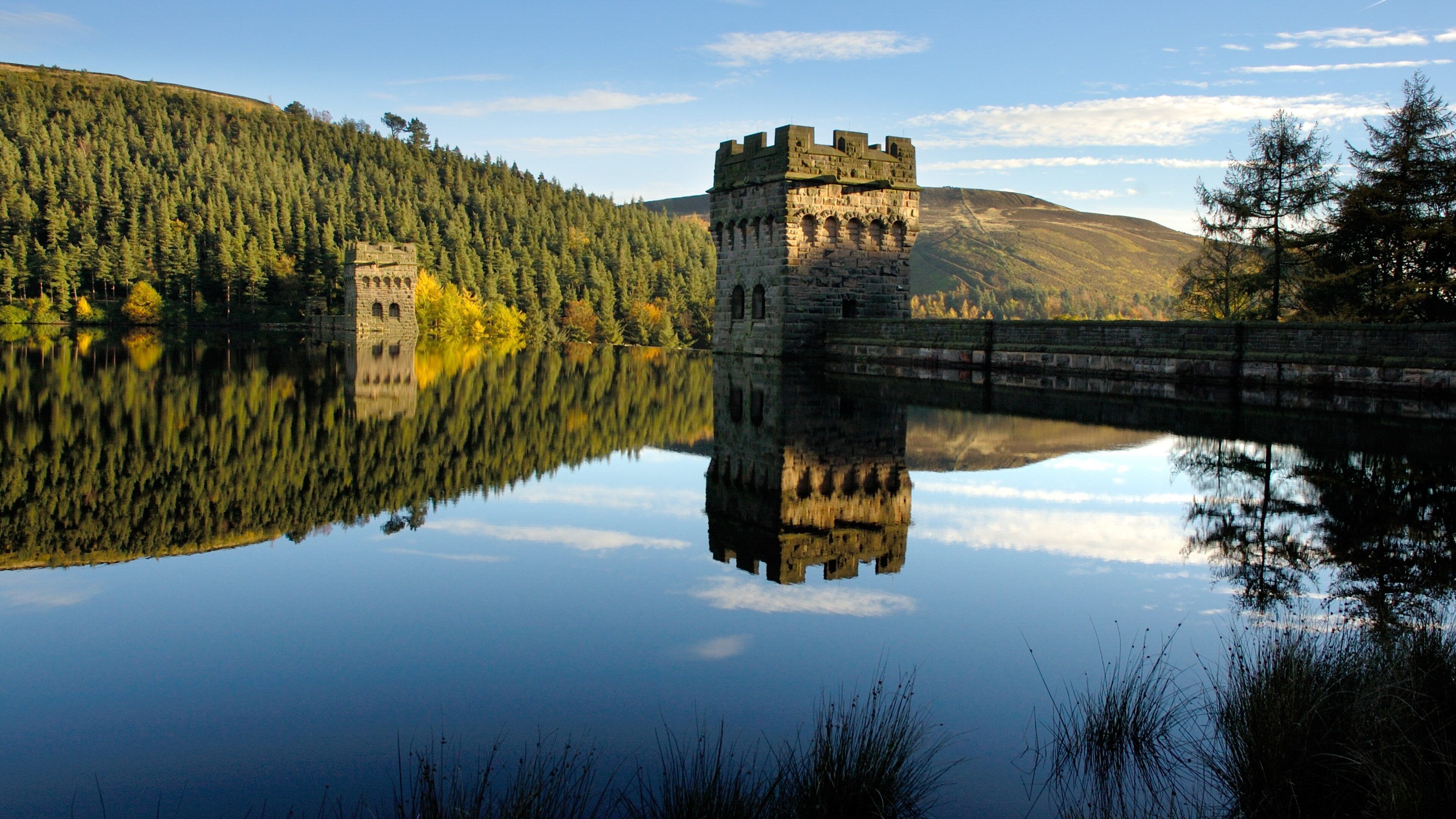Peak District National Park featuring a river or creek, a castle and heritage architecture