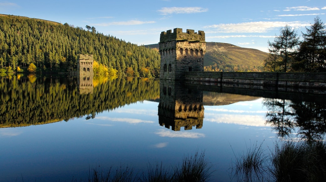Peak District National Park featuring a river or creek, a castle and heritage architecture