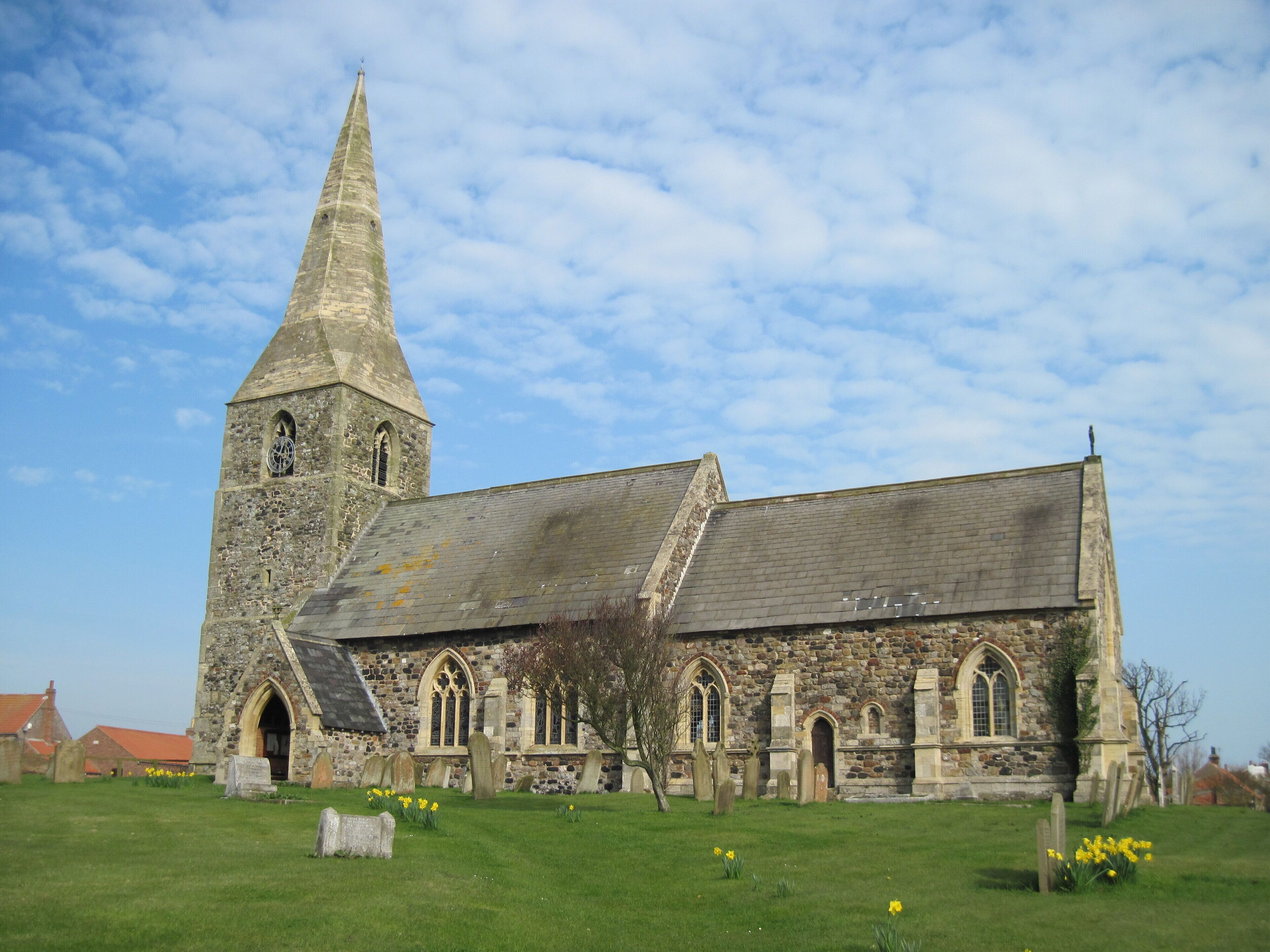 All Saints Mappleton, East Riding of Yorkshire, England. Largely rebuilt in the mid-19th century when the distinctive spire, incorporating stone salvaged from a shipwreck, was added.