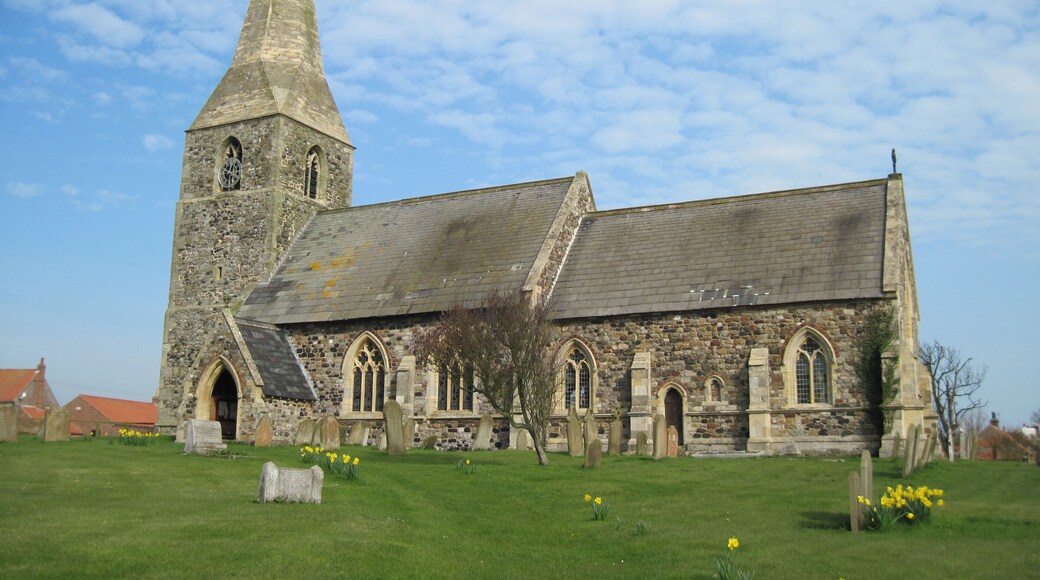 All Saints Mappleton, East Riding of Yorkshire, England. Largely rebuilt in the mid-19th century when the distinctive spire, incorporating stone salvaged from a shipwreck, was added.