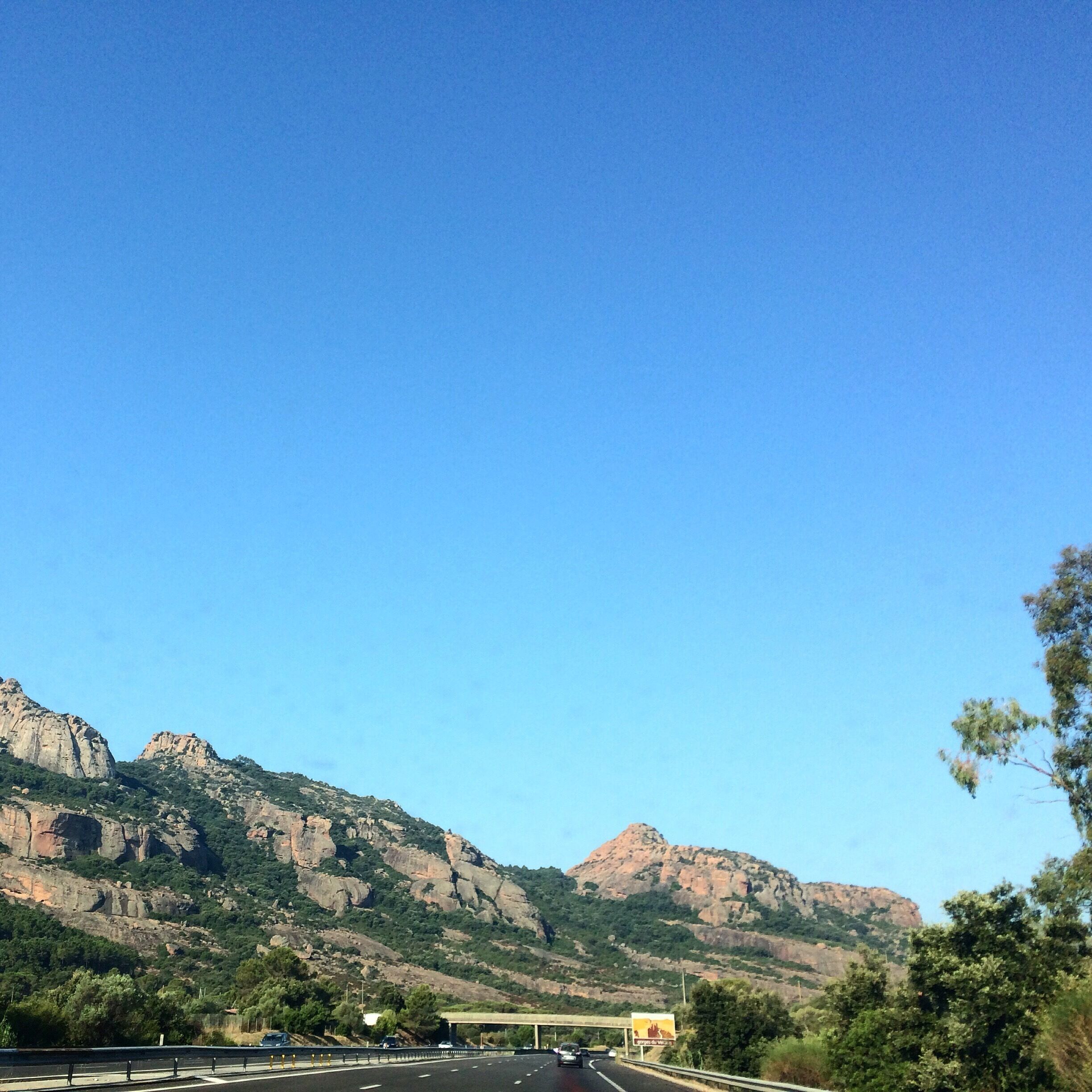 Enormous roads, mountains & mountain ranges, trees(loads), greenery(loads), flowers and tolls(loads) 😅