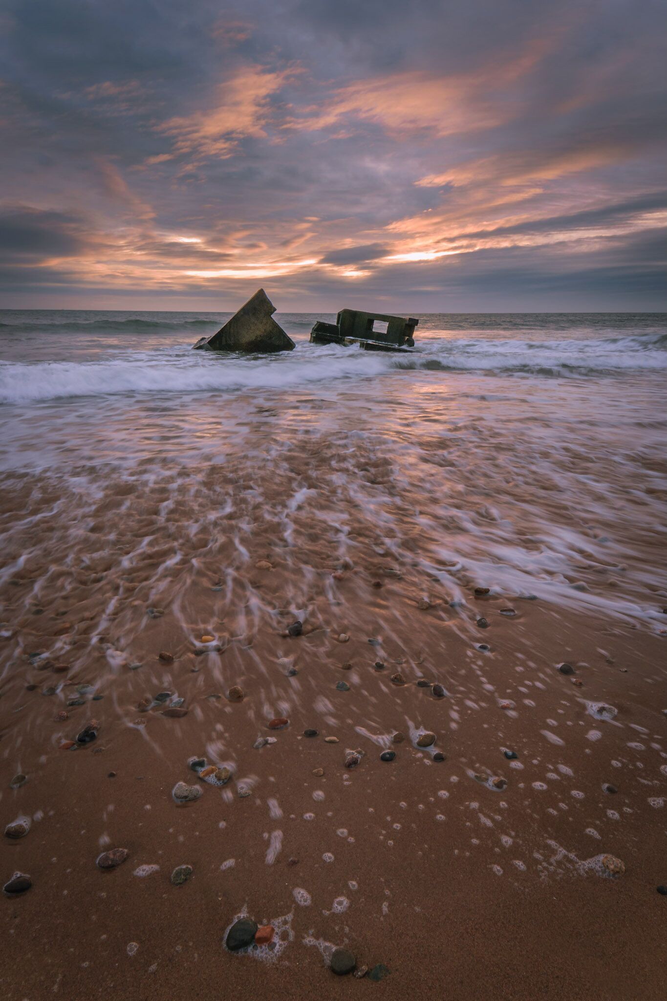 Some old Pillboxe's and anti tank defense's along the coast. Slowly fading into the sea. 