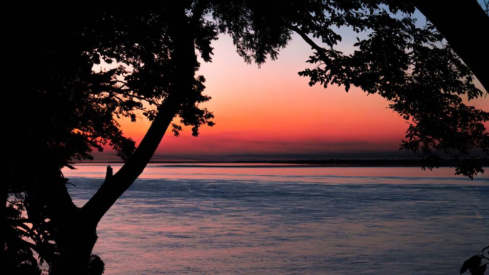 Sunset over the Paraná river at Ita Ibaté, Argentina