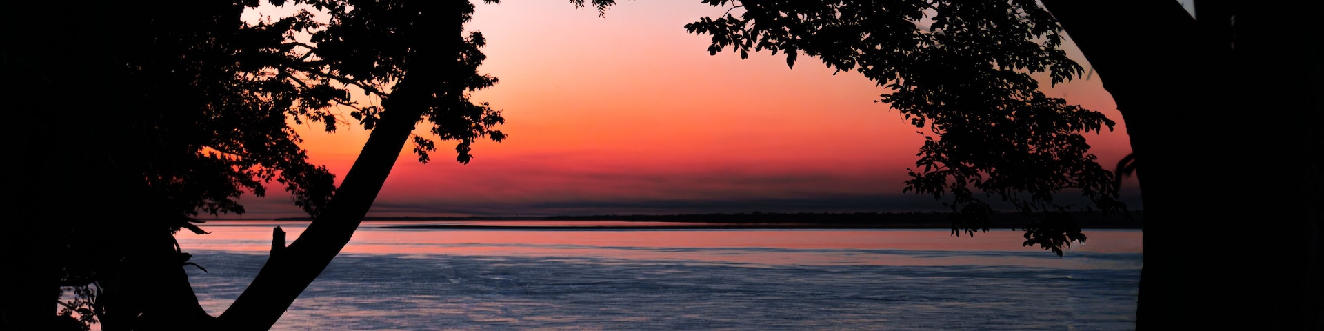 Sunset over the Paraná river at Ita Ibaté, Argentina