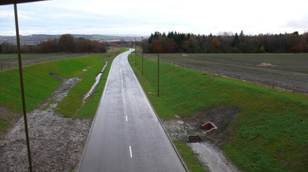 New road at Hawthornden Only when I got home did I think I should have nipped down the embankment and enjoyed the feeling of cycling on this soon to be open road without the constant worry of cars!