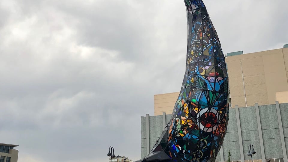 Named Space Whale this artwork is made of steel and stained glass. It was completed in 2016 and placed in the same
Downtown park at the Believe sign in 2017.