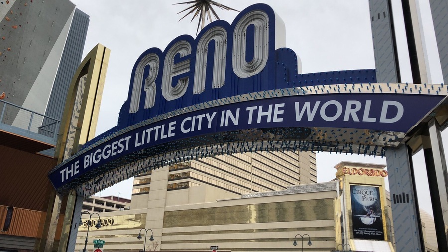 A large sign with the words "RENO" and "THE BIGGEST LITTLE CITY IN THE WORLD".