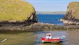 Pembrokeshire Coast National Park featuring a sandy beach, general coastal views and boating