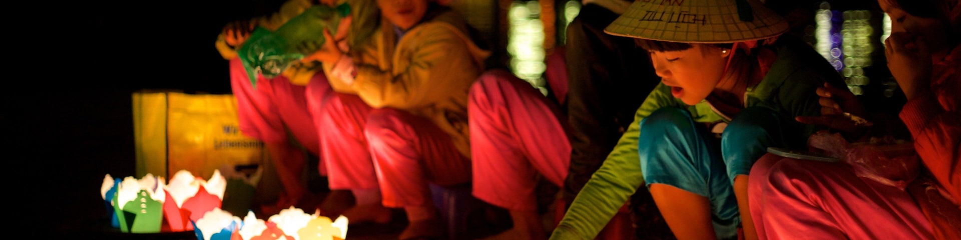 Central Vietnam showing night scenes as well as a small group of people