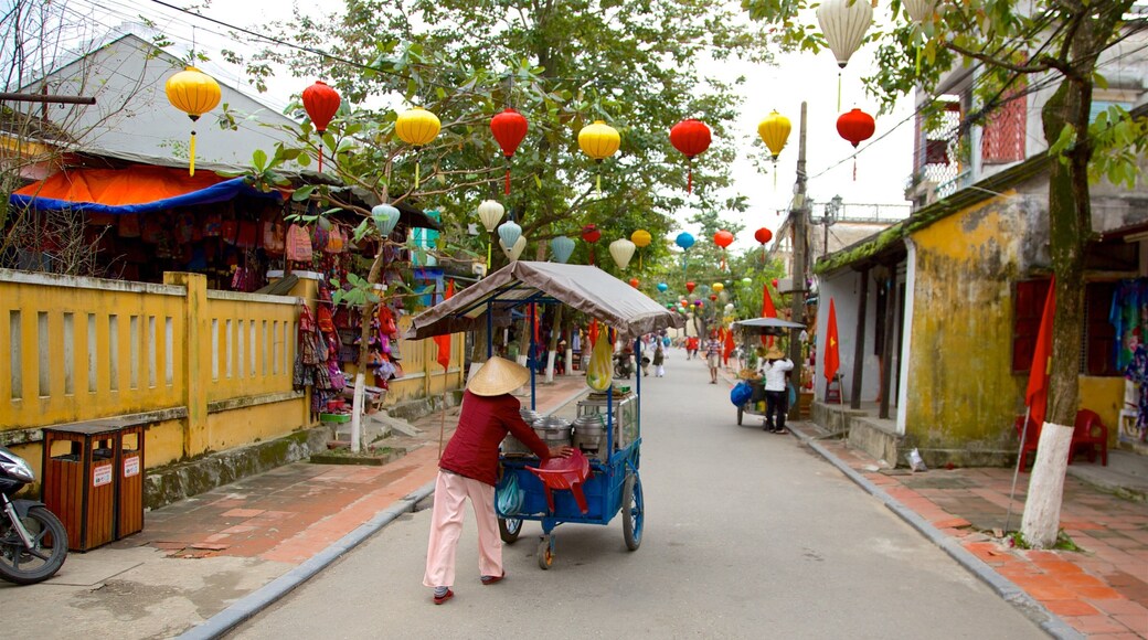 Central Vietnam showing street scenes and markets as well as an individual femail