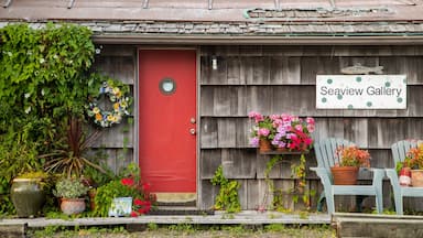 Long Beach featuring signage and flowers