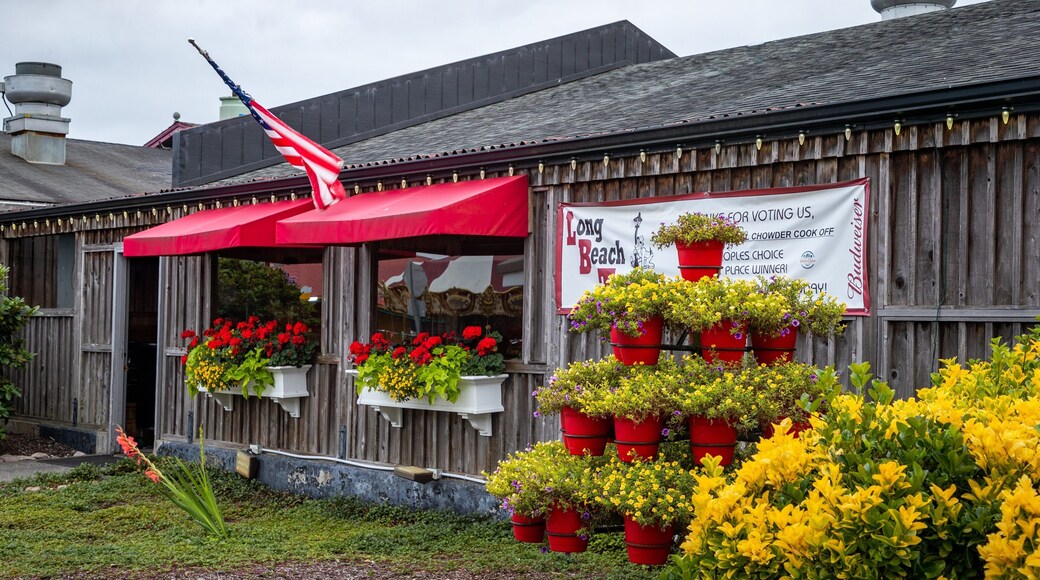 Long Beach which includes signage and flowers