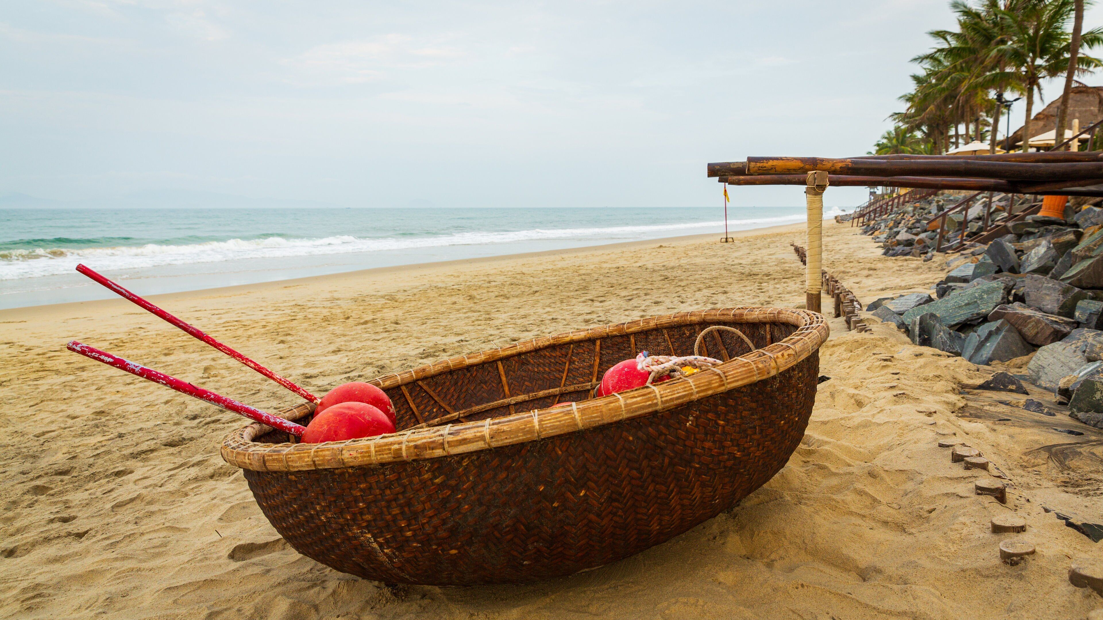 Cua Dai Beach which includes general coastal views and a beach