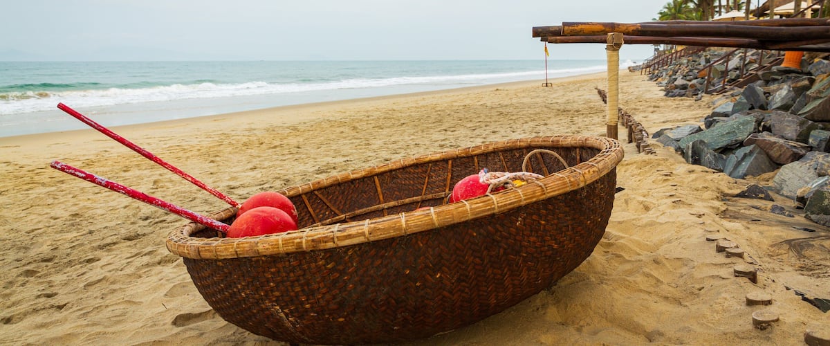 Cua Dai Beach which includes general coastal views and a beach