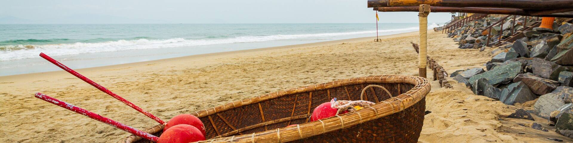 Cua Dai Beach which includes general coastal views and a beach