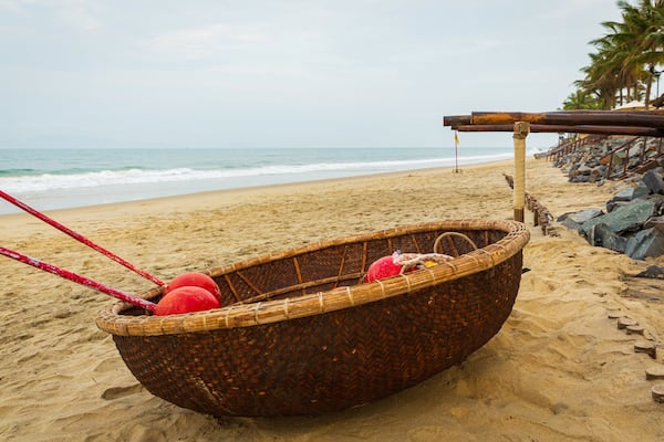 Cua Dai Beach which includes general coastal views and a beach