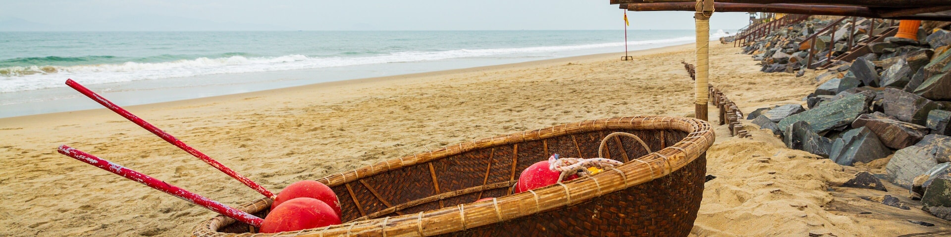 Cua Dai Beach which includes general coastal views and a beach