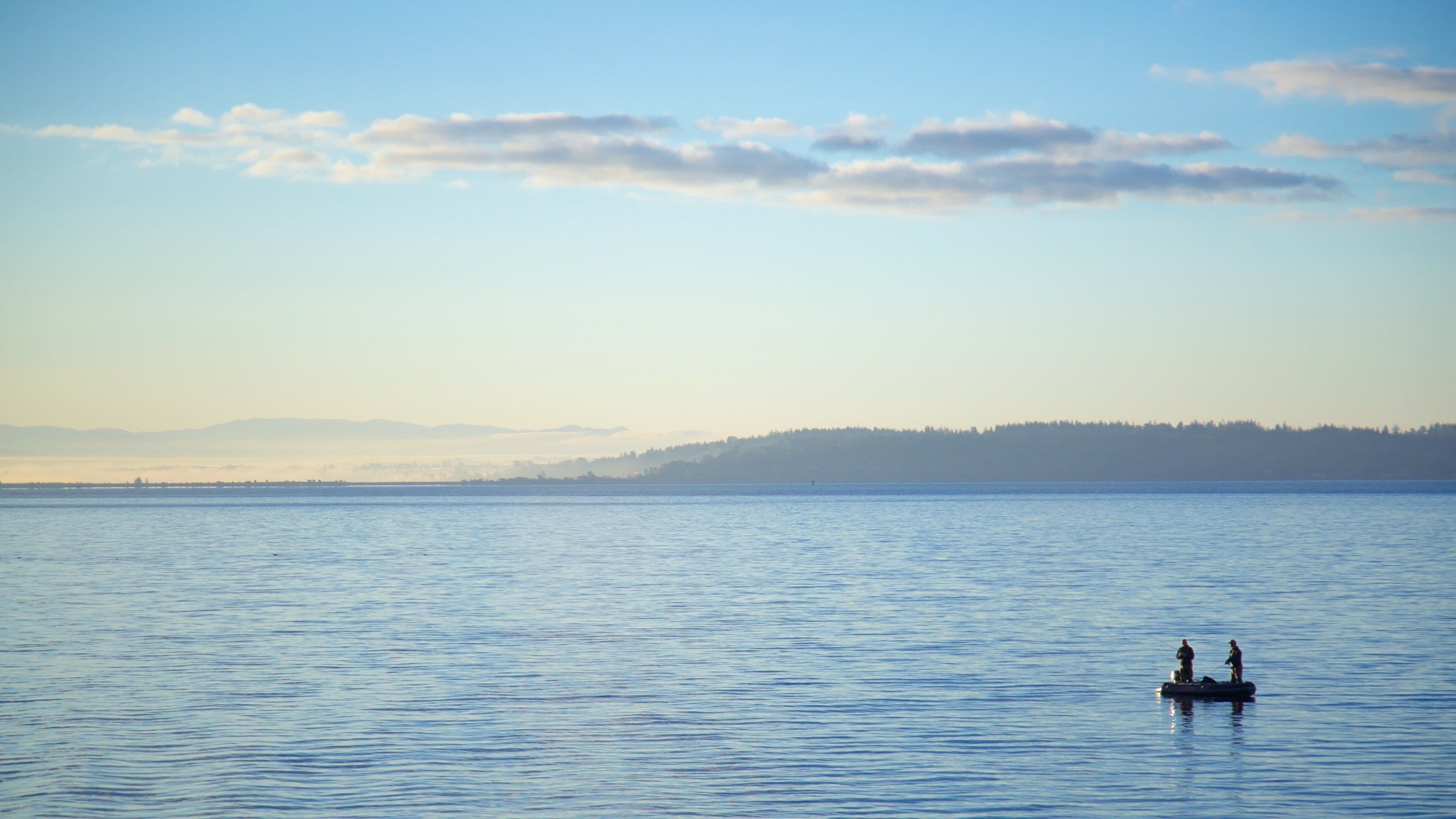 Northwest Washington which includes a bay or harbor, fishing and a sunset