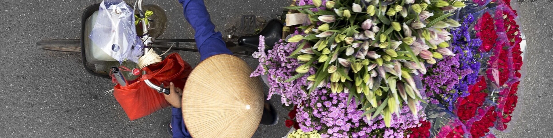 A flower lady in Hanoi #vietnam #asia #colorful