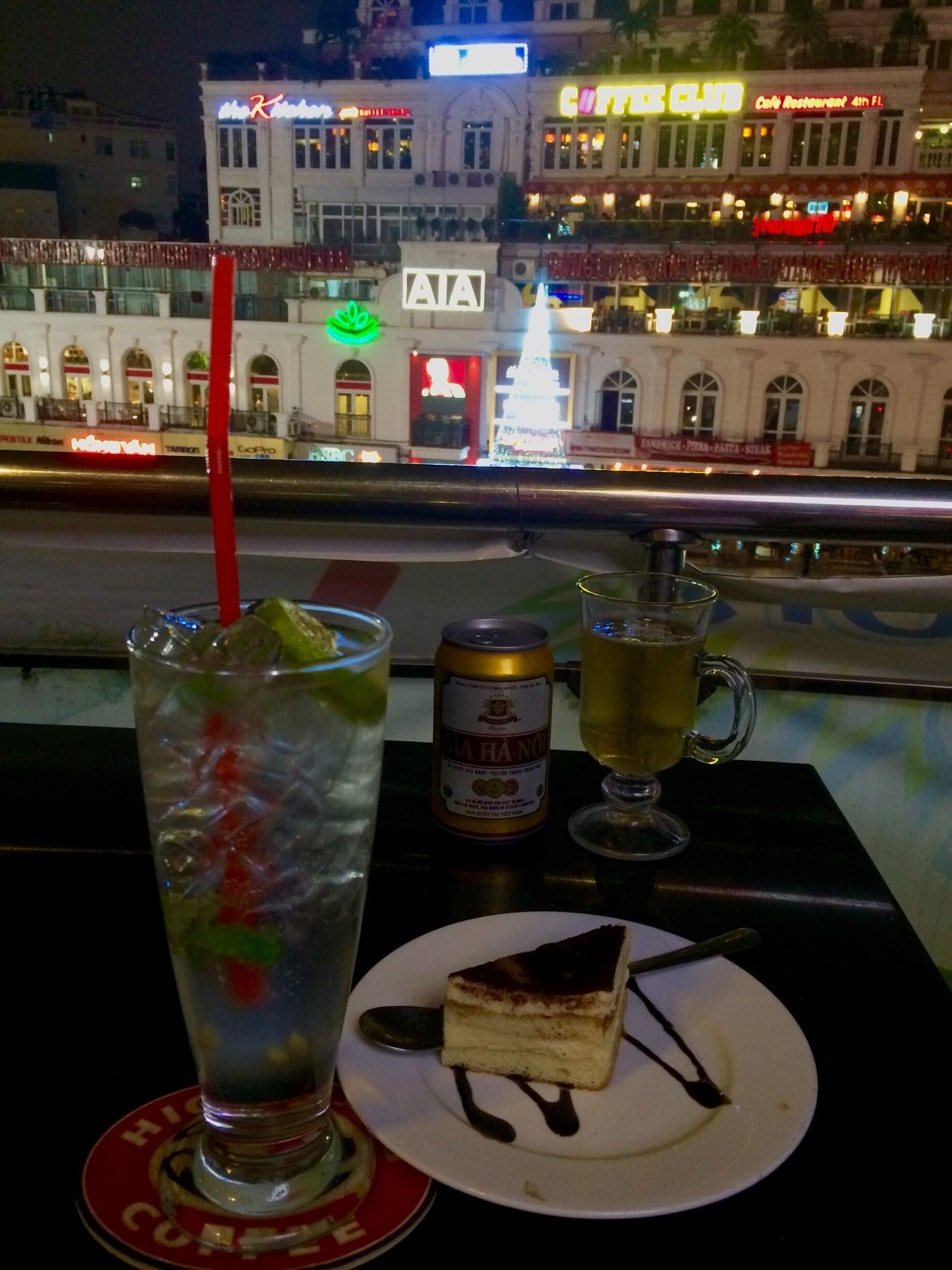 Sipping mojito enjoying tiramisu in Hanoi.