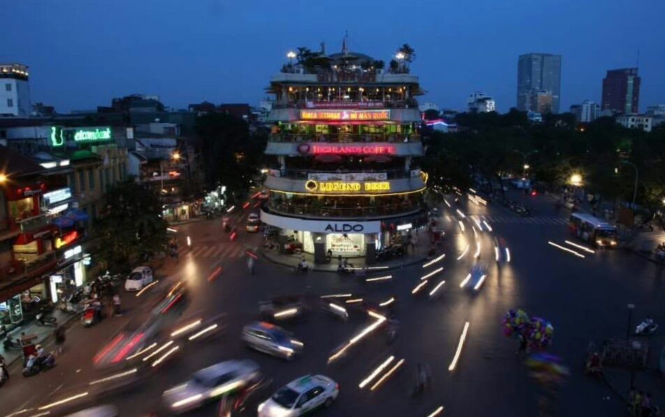 Hanoi, a city where only the bold pedestrian gets to cross to the other side of the road.

The trick is to walk at a constant pace. The driver will gauge your speed and avoid hitting you as he drives pass.