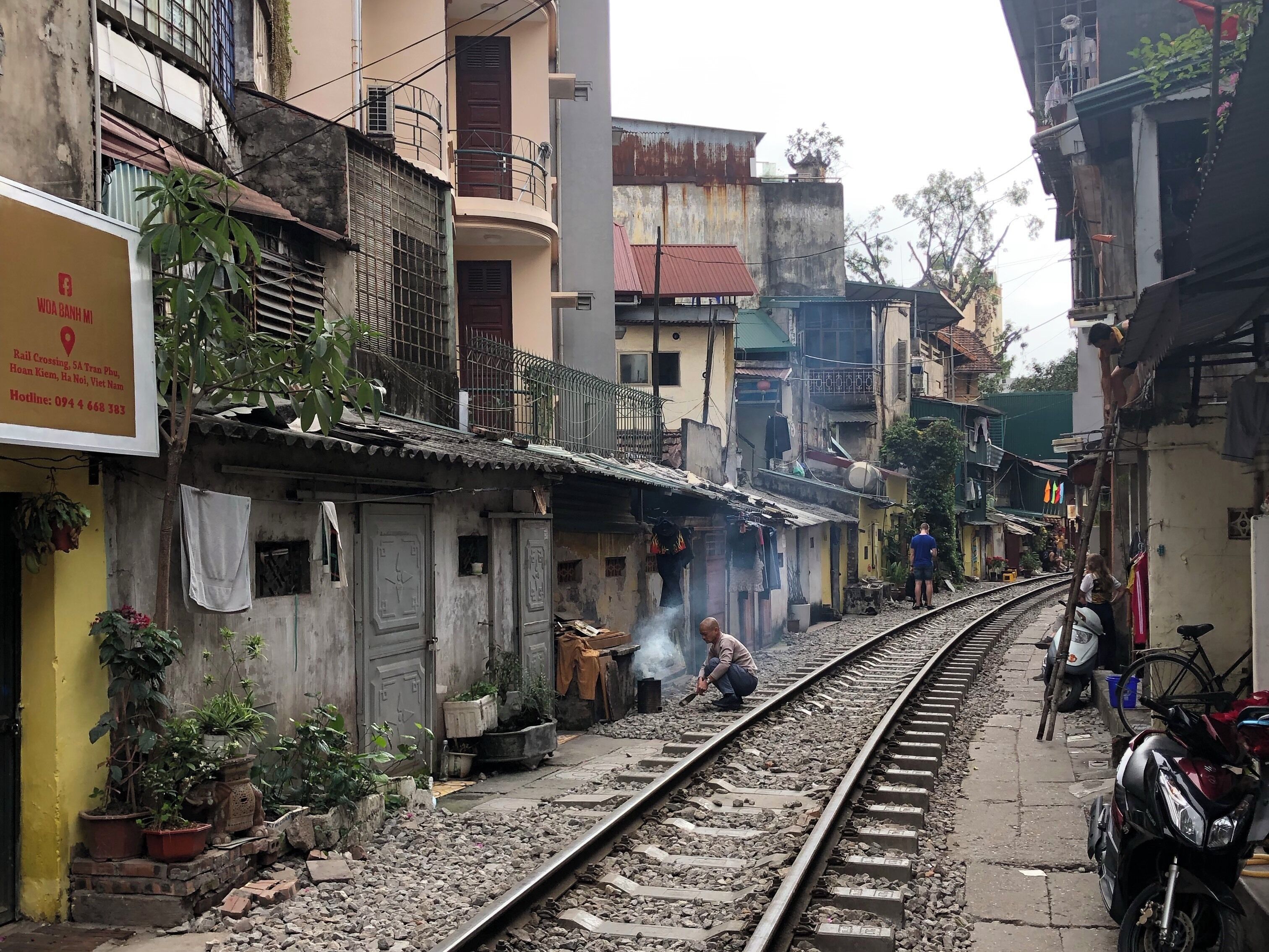 Amazing place that trains traveling through this town so close to buildings.