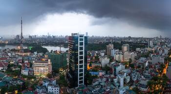 Aerial skyline view of Hanoi city, Vietnam. Hanoi cityscape by sunset period at Hai Ba Trung district viewing from Ba Trieu street