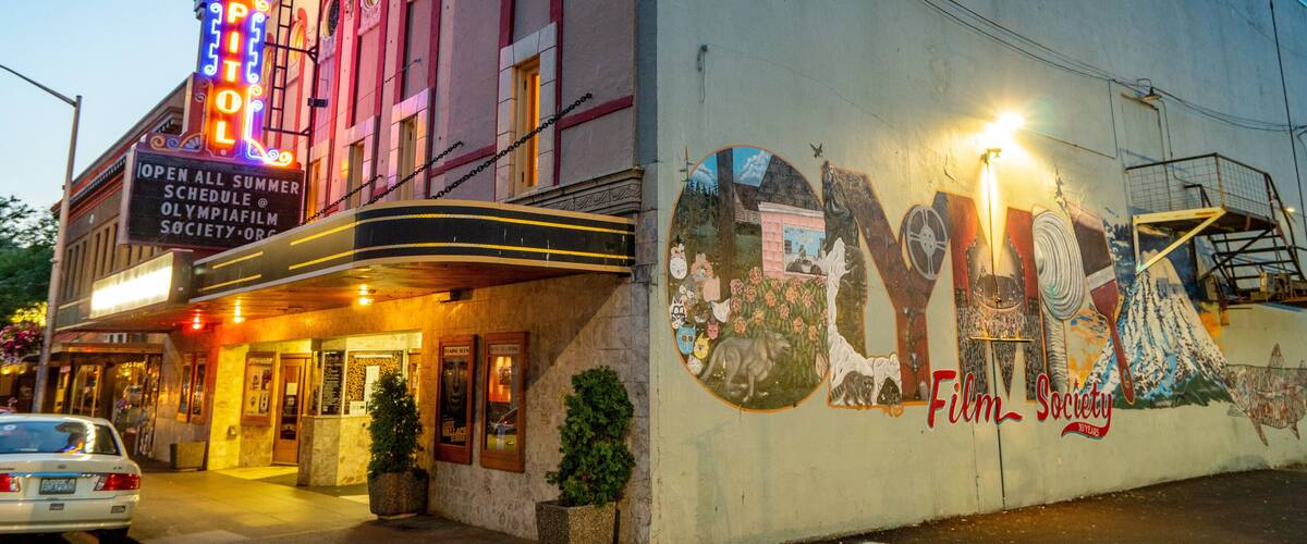 Olympia showing outdoor art and night scenes