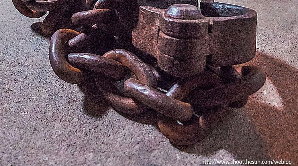 The building which houses the Historical Society, or as it's actually called: the Jefferson Museum of Art and History once contained the county courthouse and the city jail.
The courtroom remains intact, though it is now used to exhibit a continually-changing display of art.
The jail can be found in the basement, looking much as it must have for the hundred or so years of its operation.
The cells are there -- including one for solitary confinement; the glaring lights and concrete walls are all in place; and what would a worthwhile prison be without its cumbersome iron shackles?