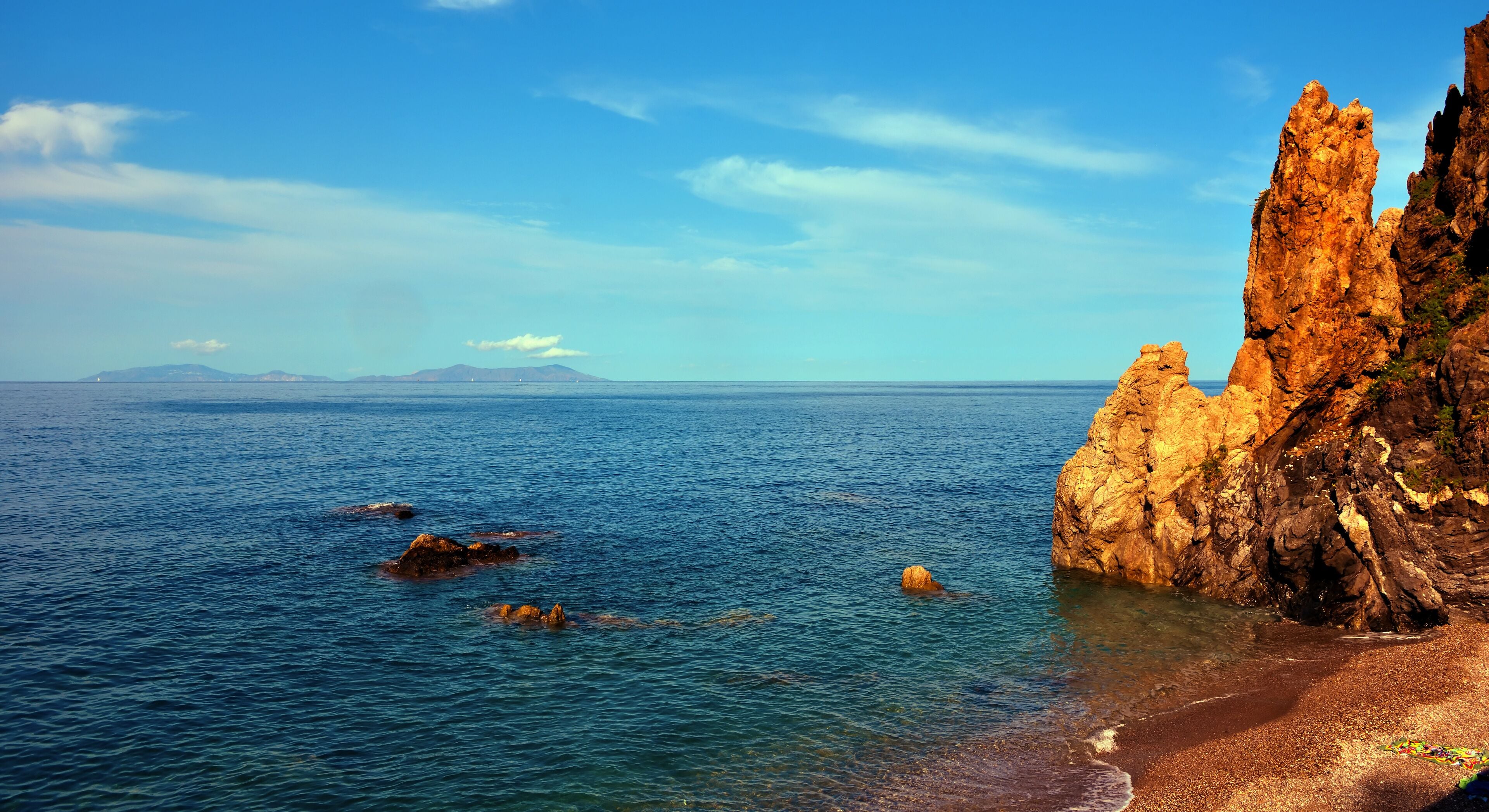 the cliffs of Capo d'Orlando and the Aeolian Islands