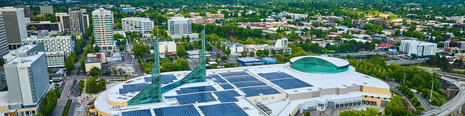 Aerial View of Portland Cityscape with Solar Panels and Highway