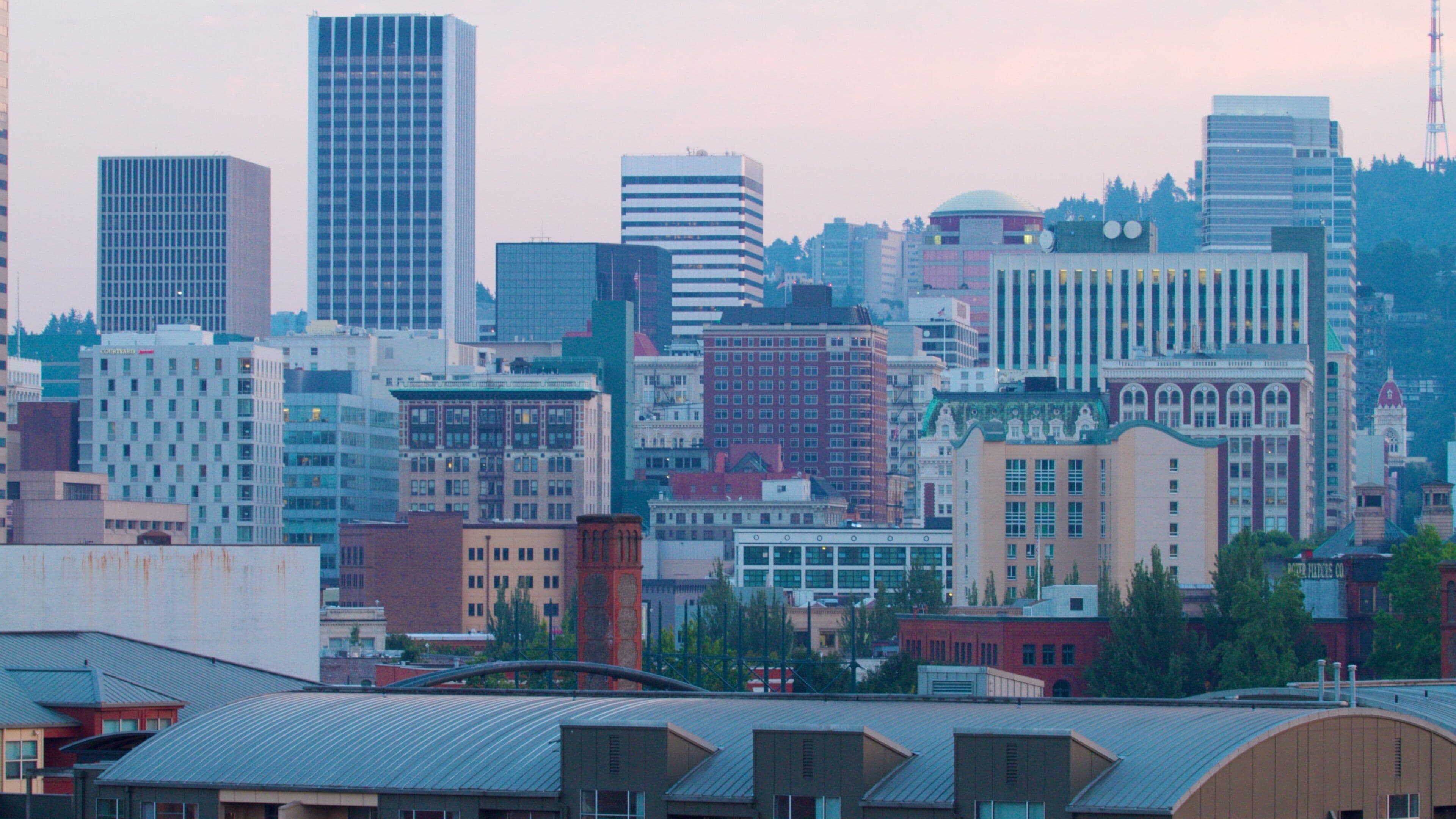 Downtown Portland showcases its unique architecture and vibrant city life during dusk in Oregon, United States