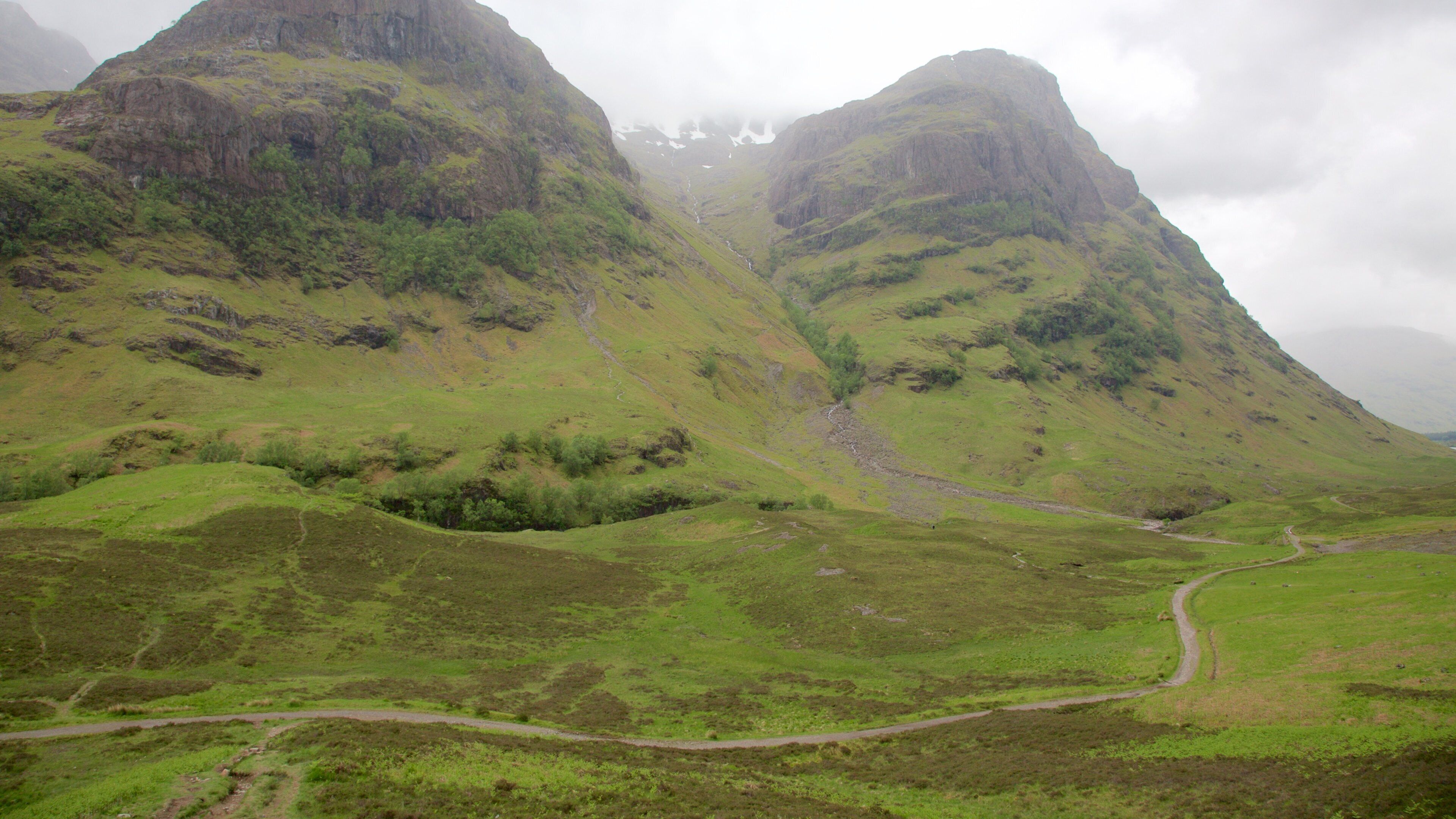 Glencoe which includes mountains and tranquil scenes