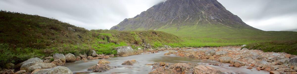 Glencoe which includes a river or creek, mountains and tranquil scenes