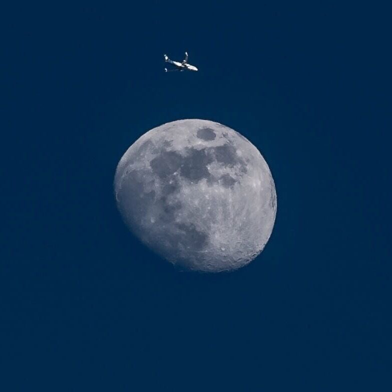 Alaska Airlines flight over the moon. #BVSBlue