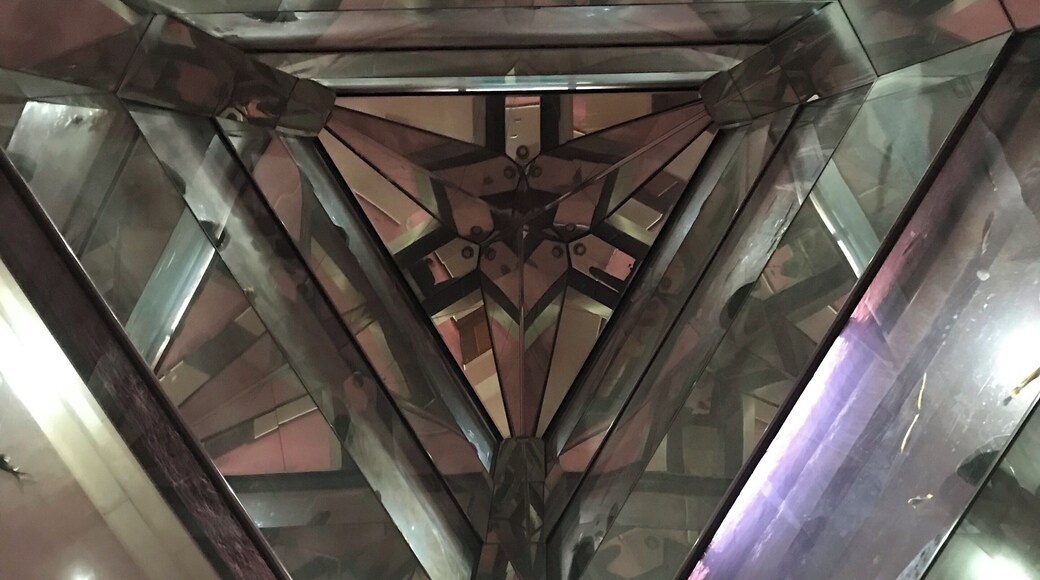 Fish tanks going all the way up several floors. The photo was taken from below looking up.