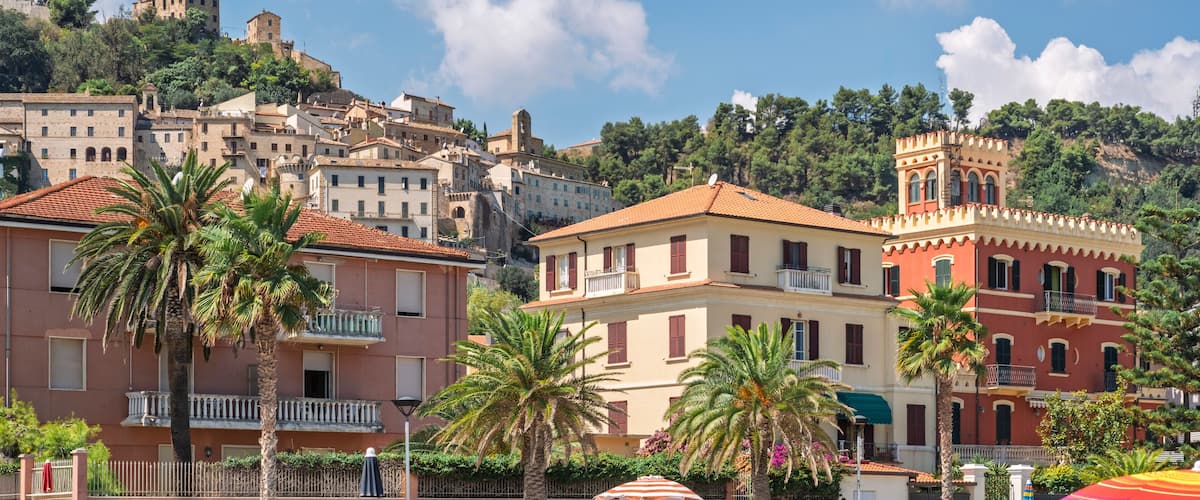 Grottammare: the 20th century villas in front of the sea and the medieval village at its back, Ascoli Piceno, Marche, Italy