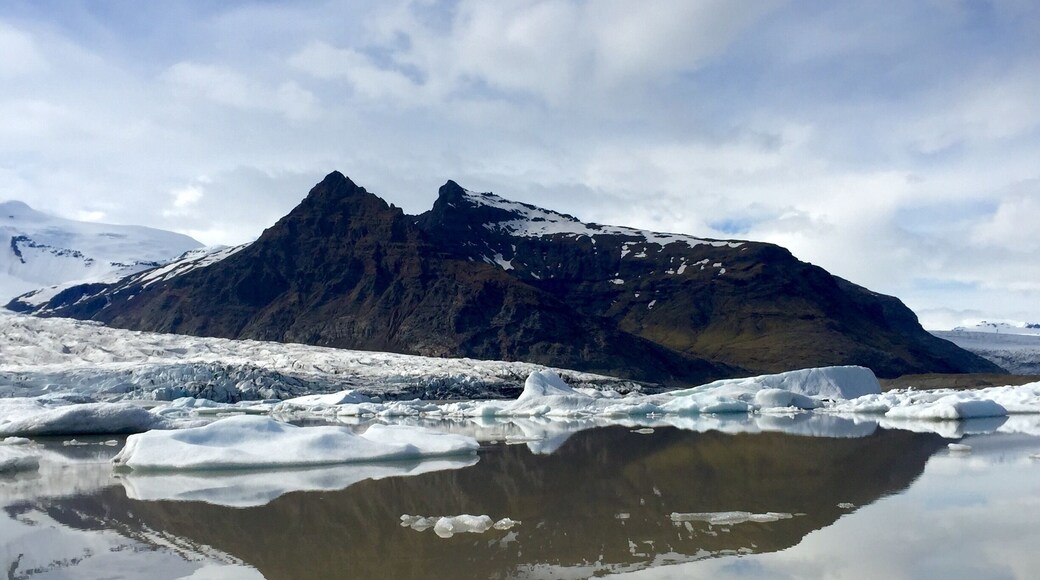 The smaller of the two lagoons. I saw this one first and it was amazing. It was off to feel like your driving in the middle of no where and then, boom, amazing glacier lagoon! Lol. I couldn't decide which boat tour to do so I chose to do both (at each lagoon). For the tour I actually liked this one better. Cozier, the guide seemed more knowledgeable, and the mountain backdrop was better. Definitely go hang out at the other lagoon on the beach, but I'd vote do the tour at this lagoon.
Love the reflections!!! This was approx 3pm in June.
O and I don't recommend if you want to try both tours to do them back to back. The lagoons are only 10km/10min from each other, but this tour went over for me so I missed the other one and had to reschedule it for the morning. Good thing I was staying nearby.
#waterlust