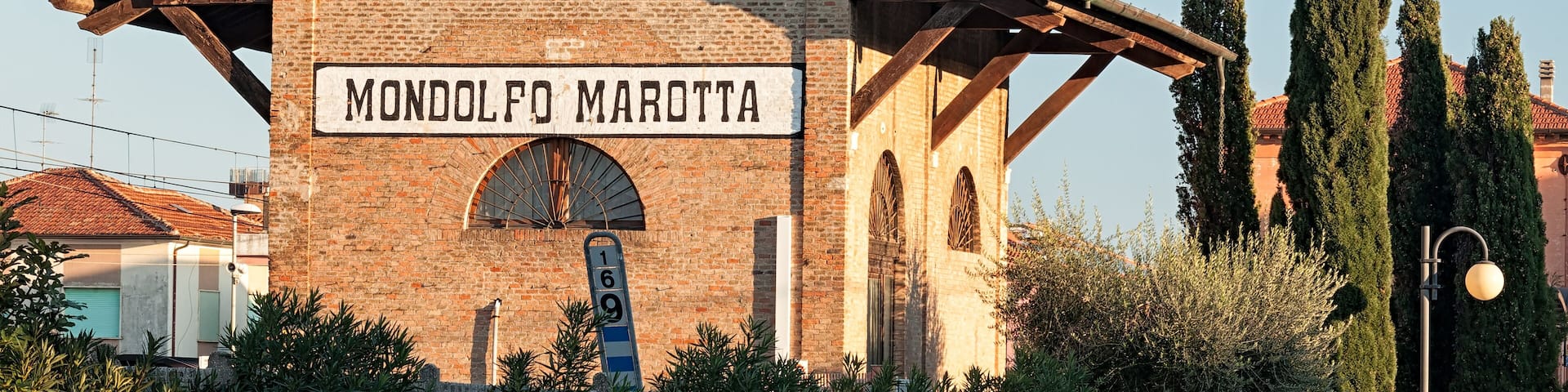 Ancient building of the train station in Marotta, Italy