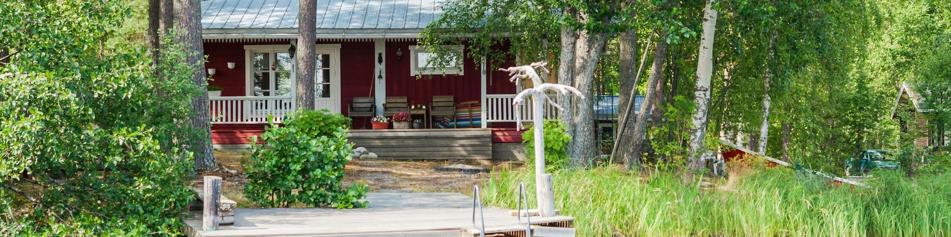 Old Finnish summer cottage at a lake