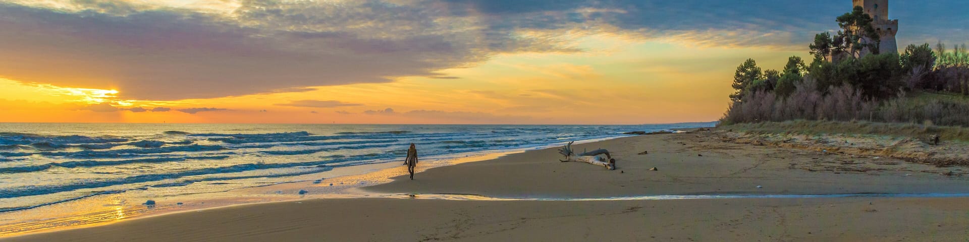 Pineto (Abruzzo, Italy) - The sunrise on the Adriatic sea, from the Pineto beach, beside the Torre di Cerrano castle