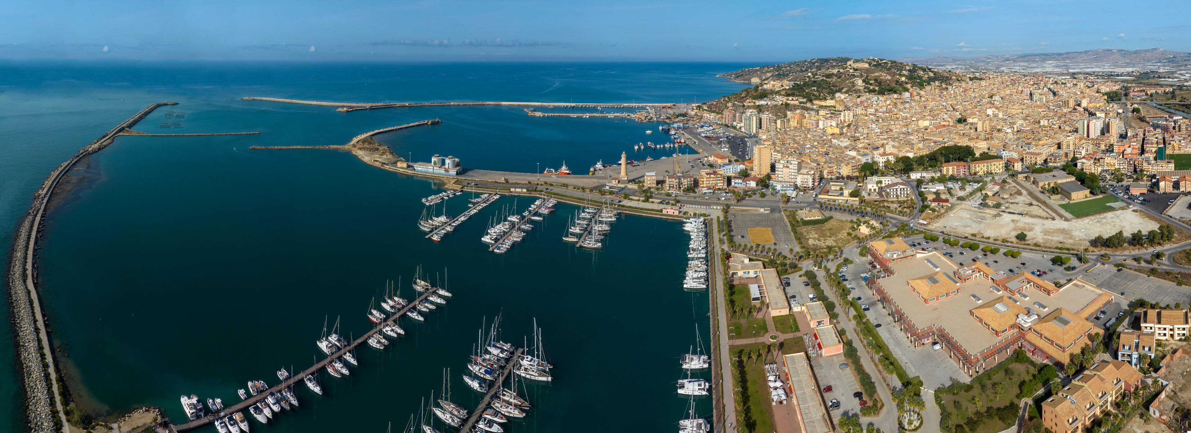 Panoramic aerial view of the city and port of Licata, a small town in the province of Agrigento, Sicily, Italy. The city overlooks the Mediterranean Sea.