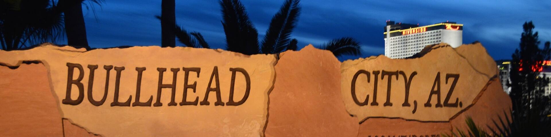 A large sign with 'BULLHEAD CITY, AZ' and 'LOS MATADORES' written on it.