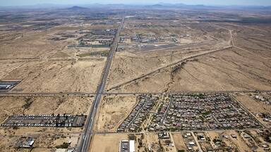 Aerial view of Casa Grande, Arizona with the airport in the foreground