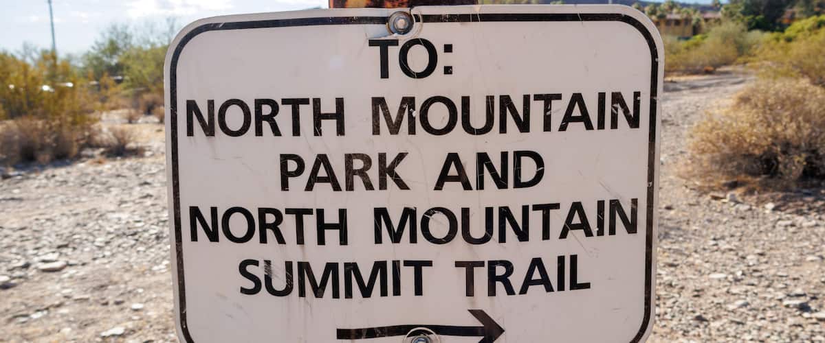 A directional sign for North Mountain Park and North Mountain Summit Trail.