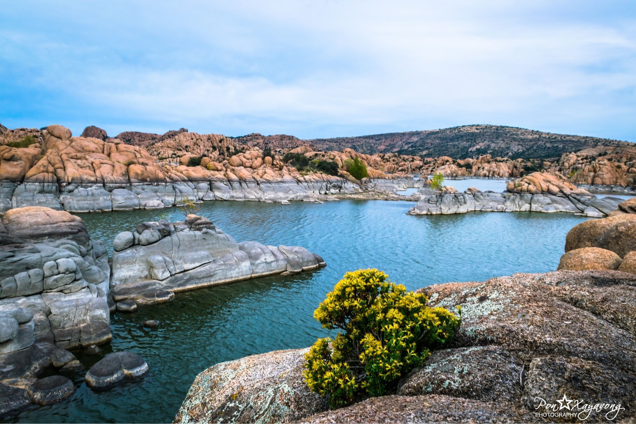 $2 entrance fee. Watson Lake at Watson Park is conveniently located about 4 miles from Prescott Arizona and features fishing, boating, kayaking, canoeing, hiking, rock climbing, camping and day picnicking. Watson's water surface is about 380 surface acres and distinguished by its sky blue calm waters surrounded by huge granite boulders. 