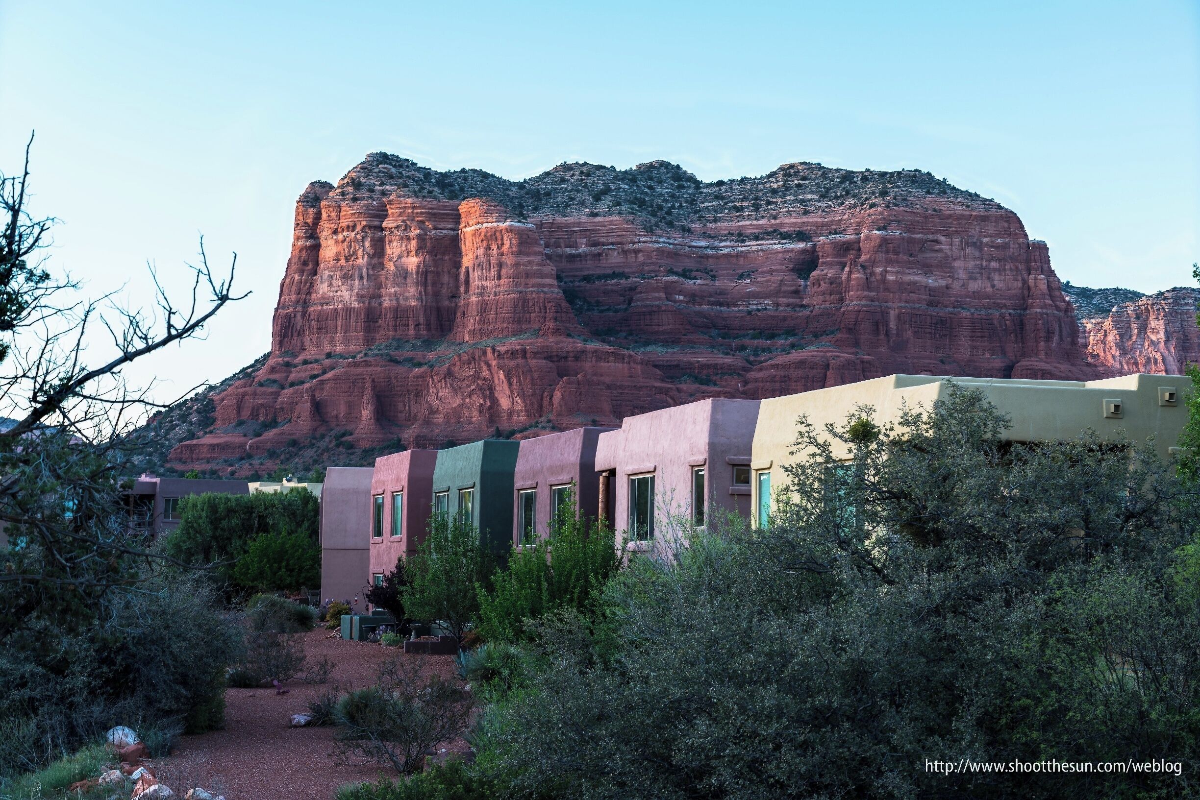 The sleepy little town of Oak Creek at sunset, in the shadow of Courthouse Rock.